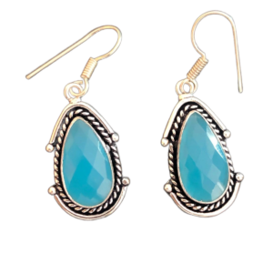 Elegant 925 sterling silver earrings featuring smooth chalcedony gemstones, with their soft, translucent blue hue, set in sleek silver settings that enhance the understated beauty of the stones